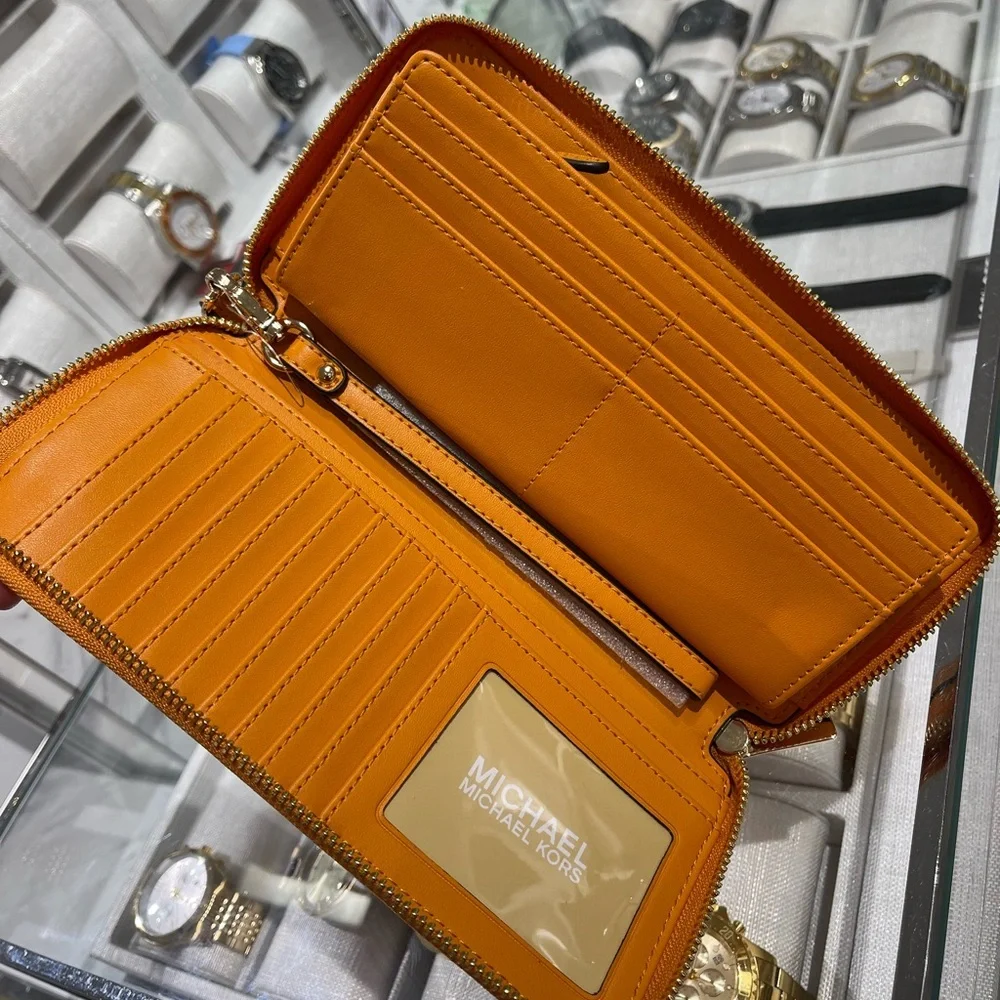 MICHAEL KORS Jet Set Travel Lg Pebbled Leather Continental Wristlet
Rad Orange - Picture 7 of 16